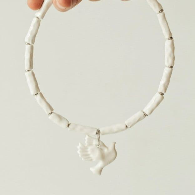 Намисто з голубкою біле YAGLYNA